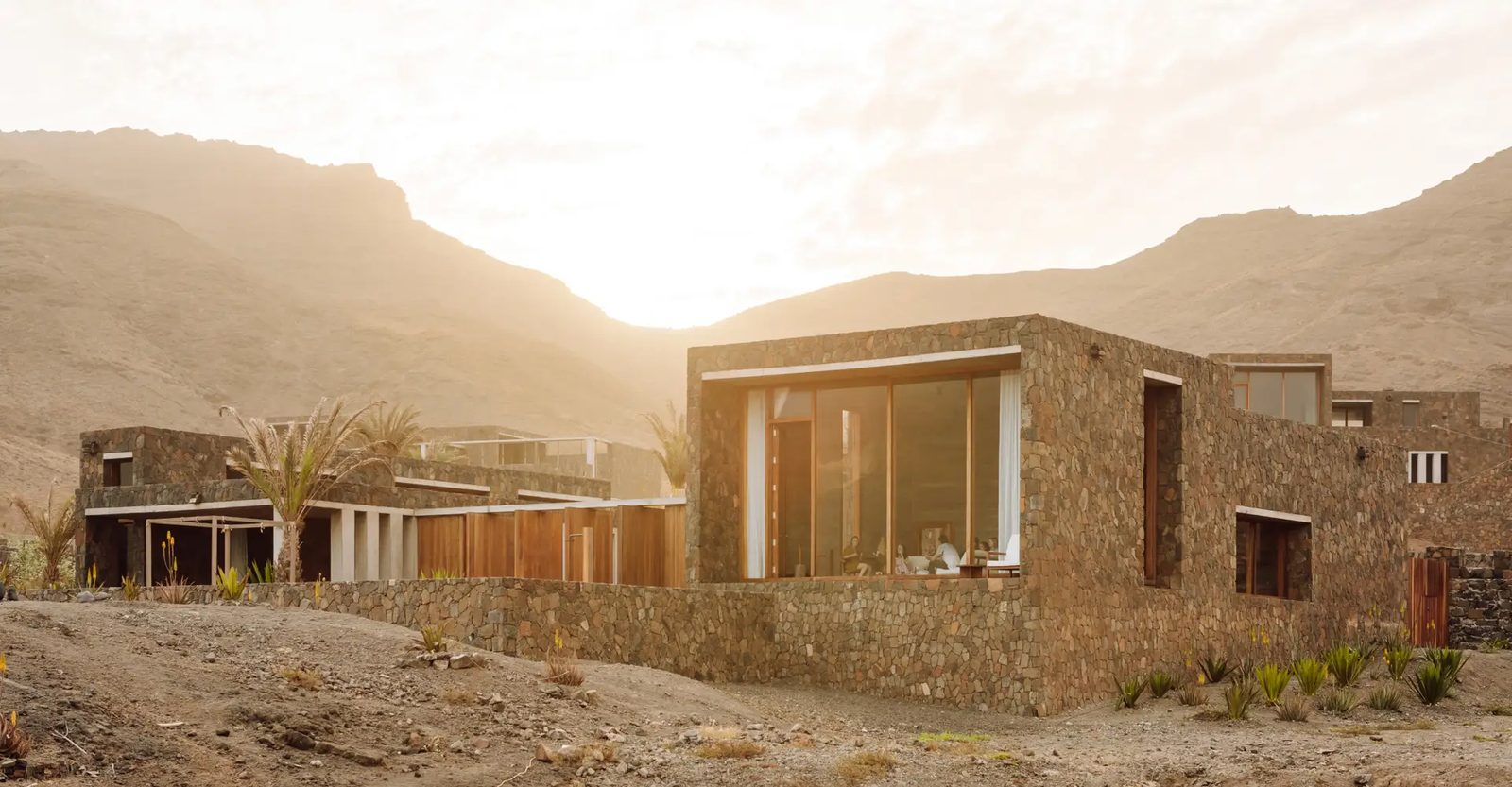 Barefoot Luxury, stone villa at sunset