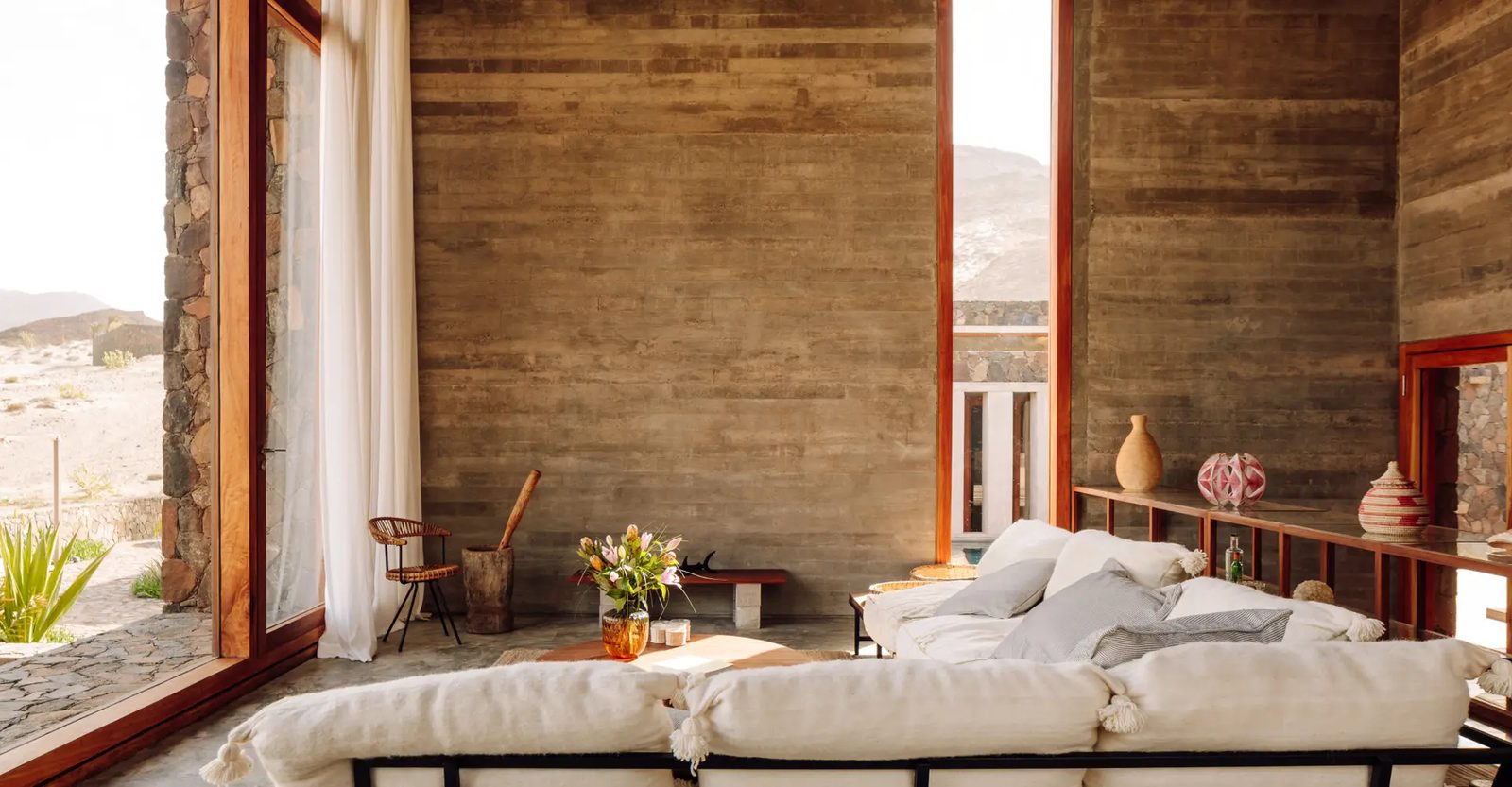 Barefoot Luxury — sea view through floor-to-ceiling window